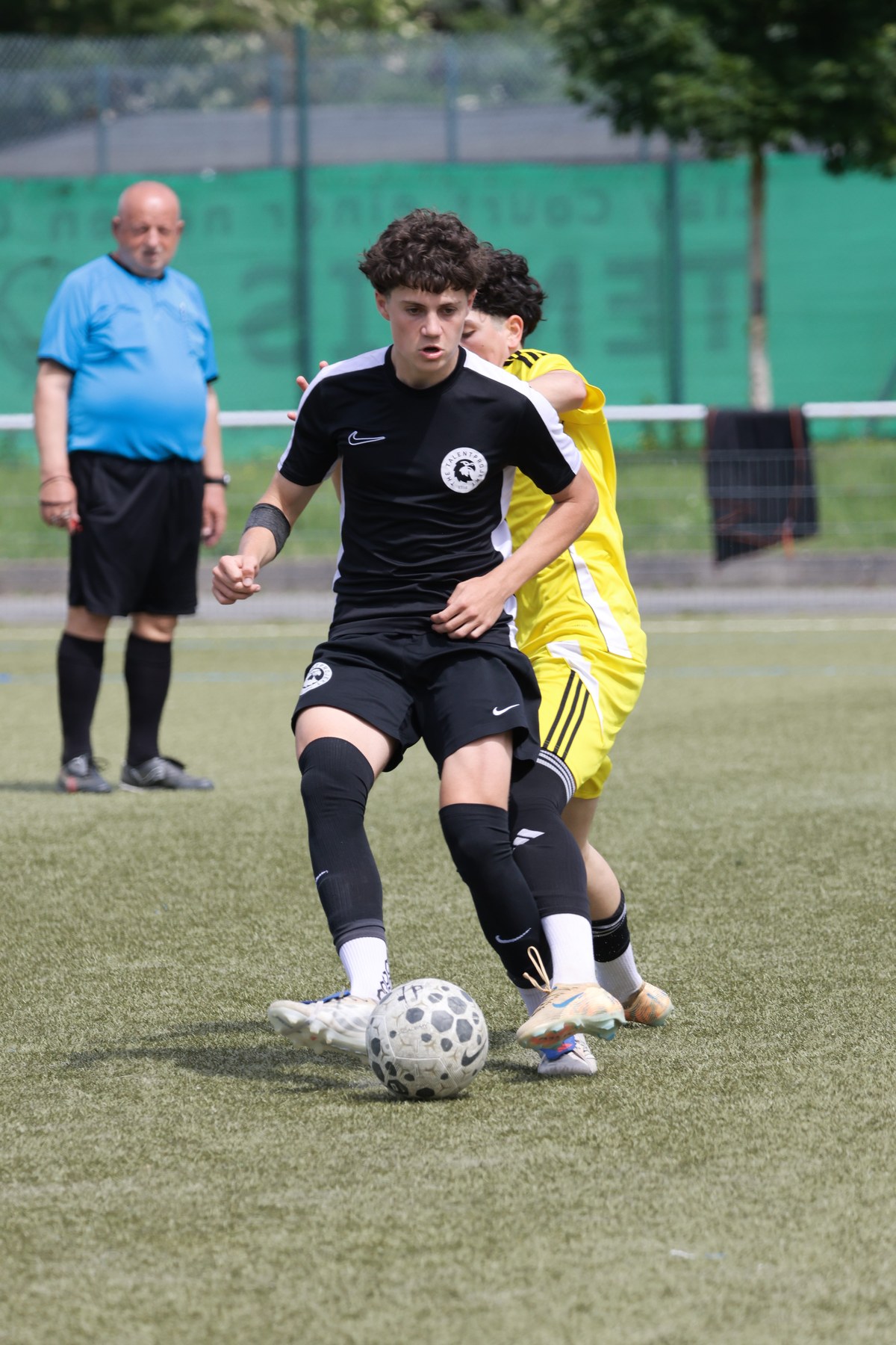 Christian Wenzel shielding the ball under pressure