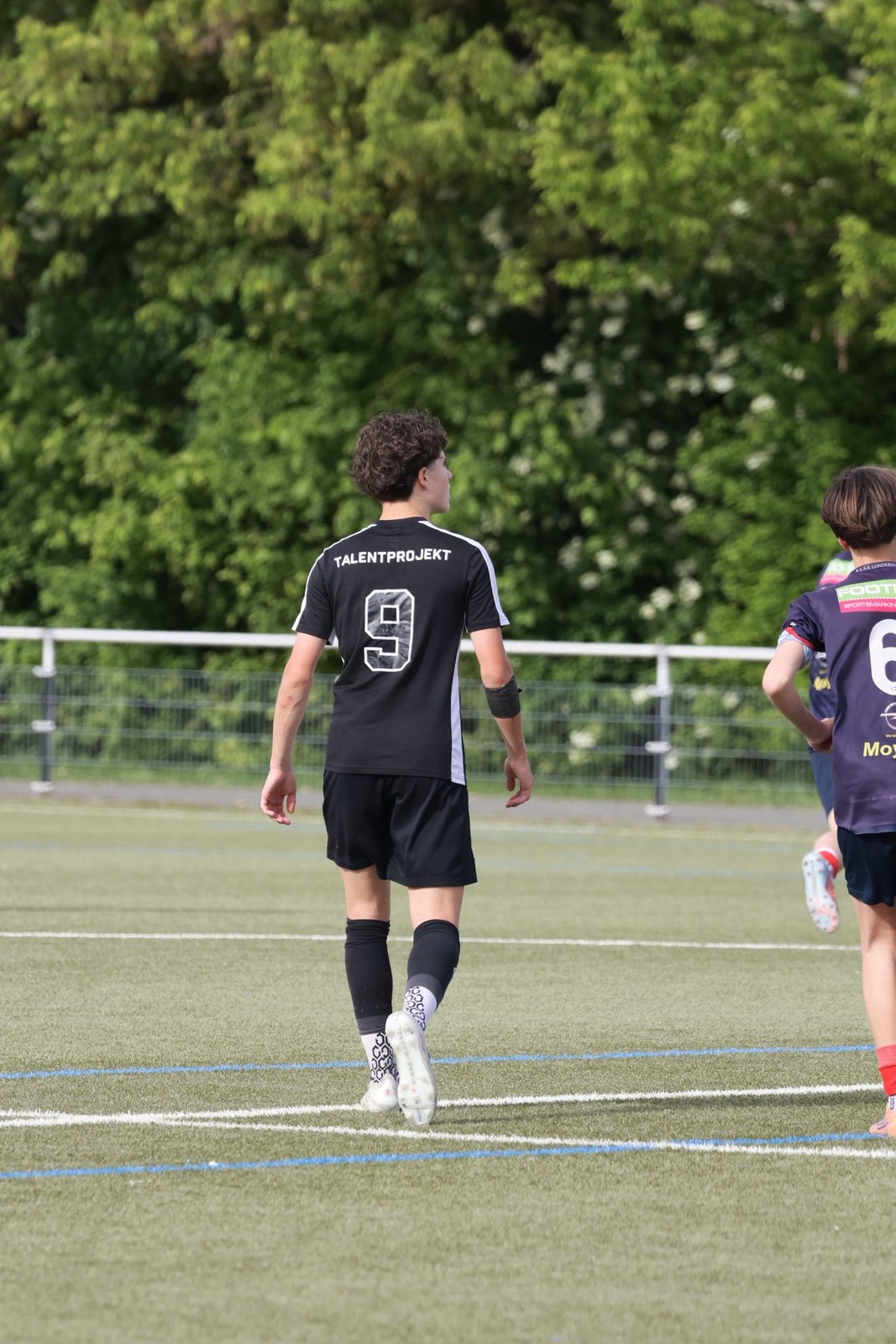 Christian Wenzel wearing TalentProjekt number 9 kit