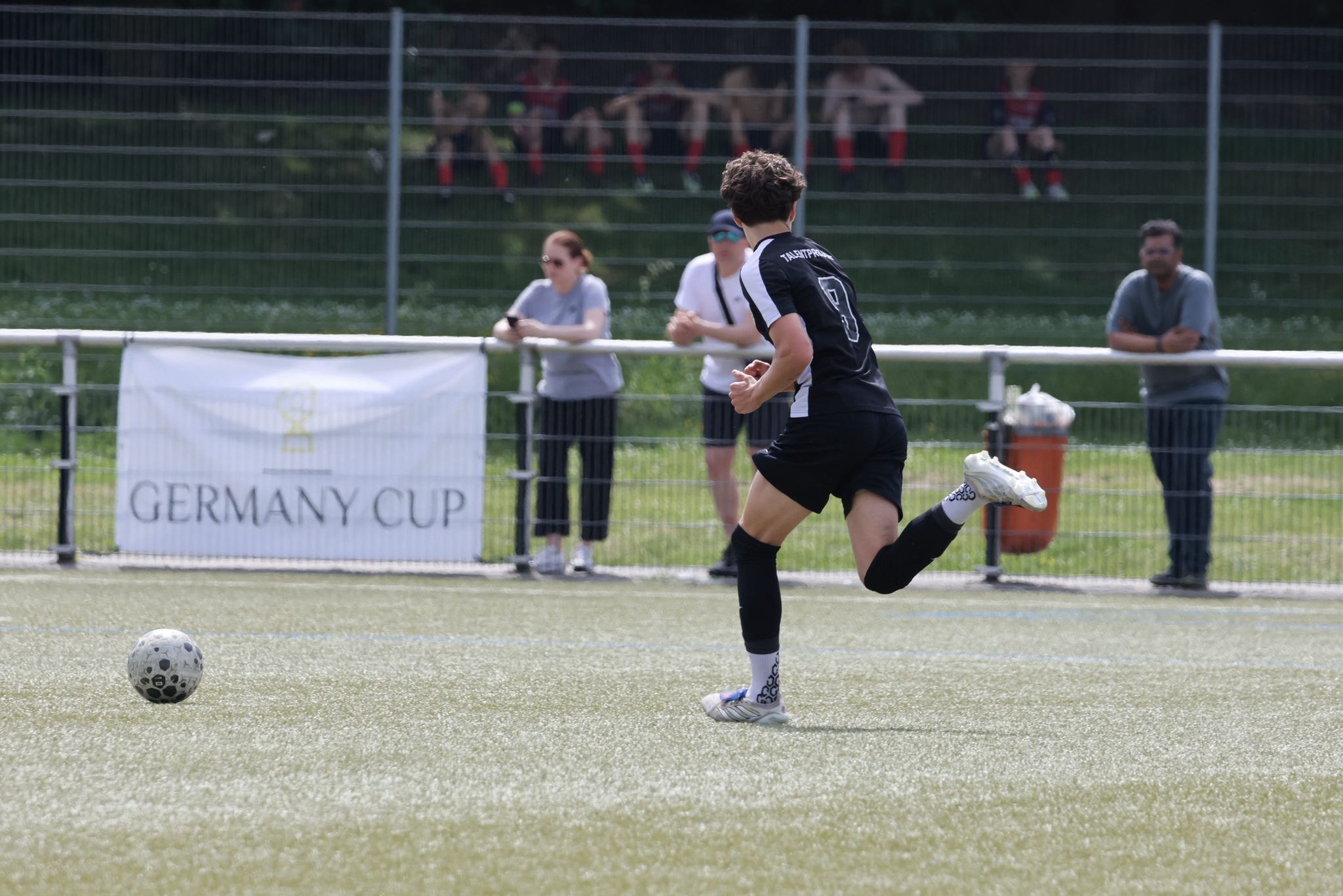 Christian Wenzel carrying the ball in match action